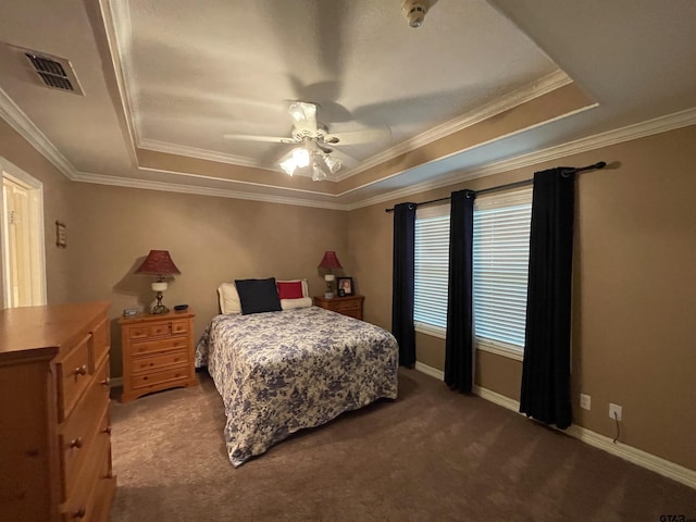 3617 Flagstone Dr, Tyler, TX 75707 - carpeted bedroom with a tray ceiling, crown molding, a ceiling fan, and baseboards