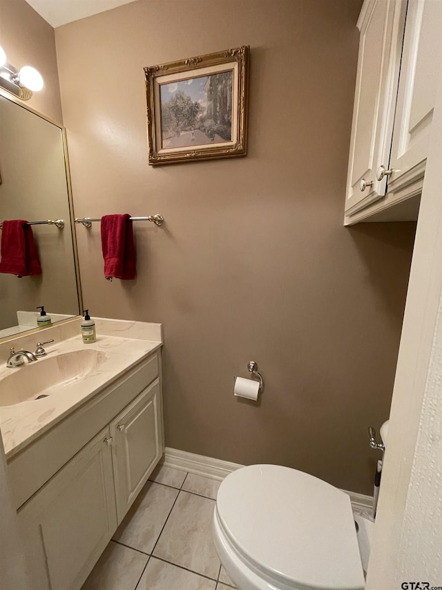 3617 Flagstone Dr, Tyler, TX 75707 - bathroom featuring toilet, vanity, baseboards, and tile patterned flooring
