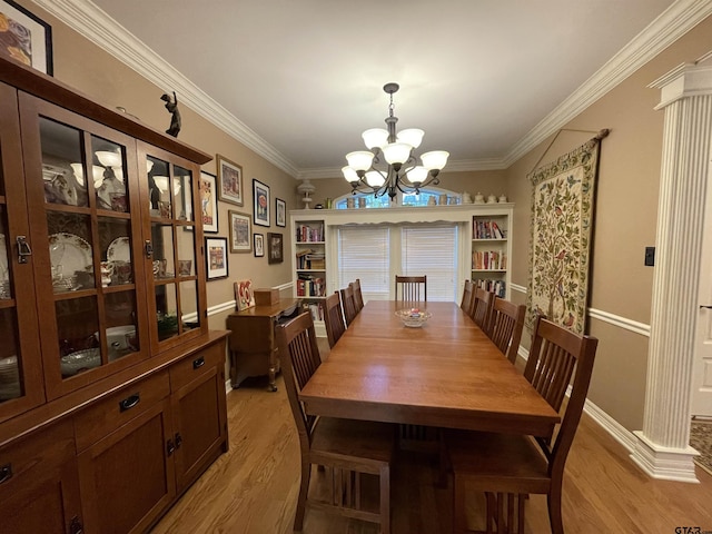 3617 Flagstone Dr, Tyler, TX 75707 - dining room featuring light wood-style floors, a chandelier, and crown molding