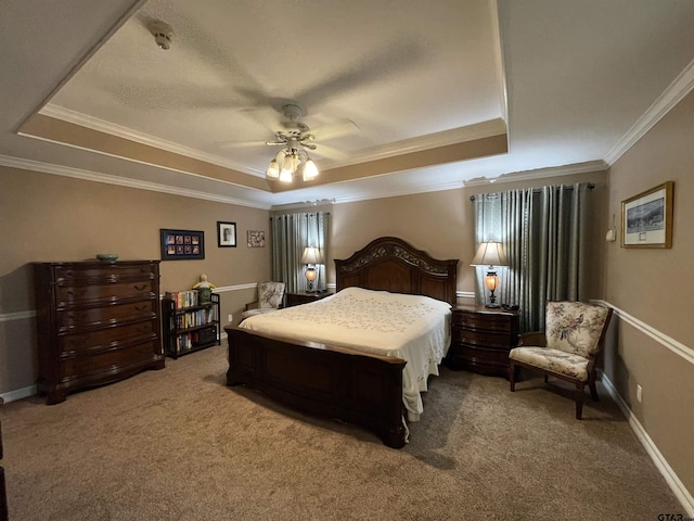 3617 Flagstone Dr, Tyler, TX 75707 - bedroom featuring a raised ceiling, carpet, ornamental molding, and ceiling fan