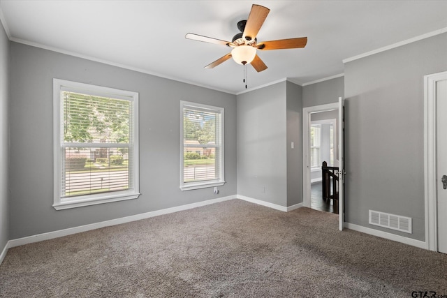 513 E Young, Longview, TX 75602 - spare room with crown molding, a ceiling fan, and carpet floors