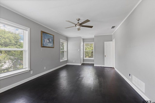 513 E Young, Longview, TX 75602 - unfurnished room with dark wood finished floors, ceiling fan, and ornamental molding