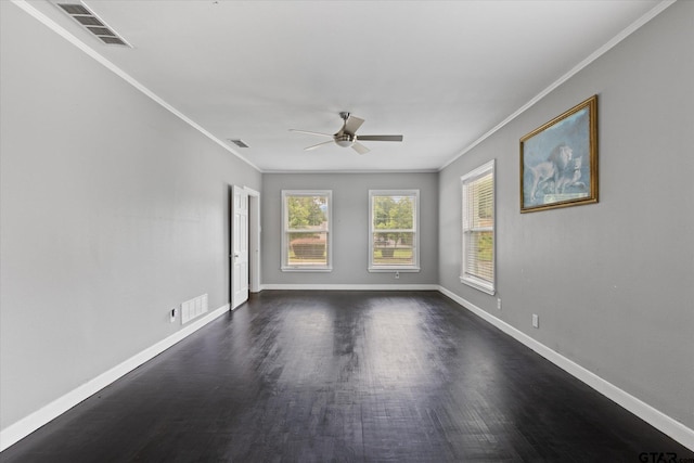 513 E Young, Longview, TX 75602 - empty room with ornamental molding, a ceiling fan, and dark wood finished floors