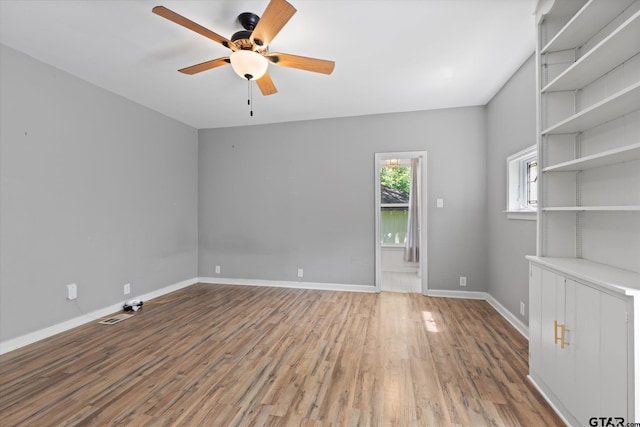 513 E Young, Longview, TX 75602 - spare room with ceiling fan and wood finished floors