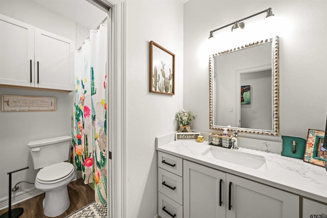 full bath with a shower with curtain, vanity, toilet, and wood finished floors