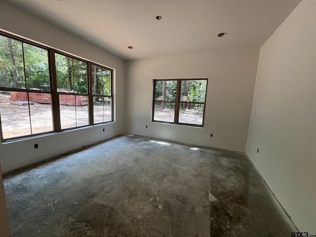 14664 Jade Forest Trl, Tyler, TX 75707 - empty room with concrete flooring