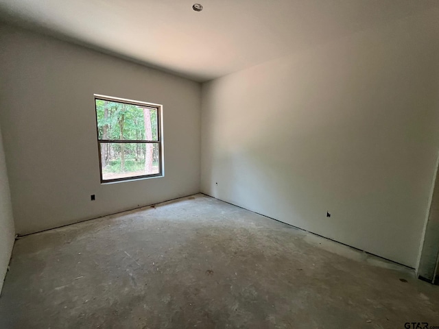 14664 Jade Forest Trl, Tyler, TX 75707 - empty room with unfinished concrete floors