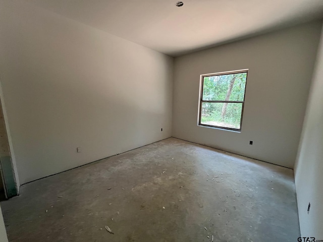 14664 Jade Forest Trl, Tyler, TX 75707 - unfurnished room with concrete flooring