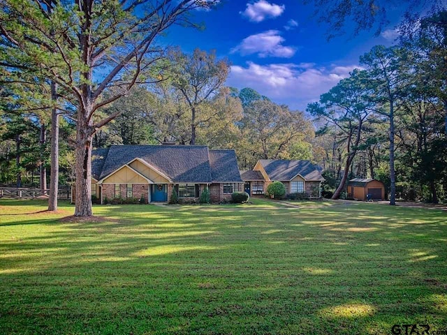 ranch-style home featuring a front lawn