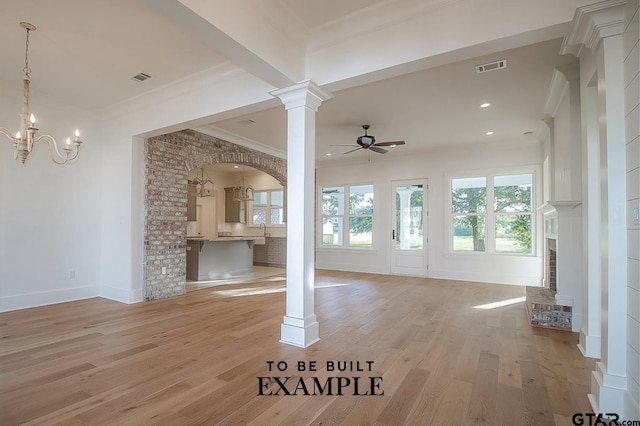 unfurnished living room with ceiling fan with notable chandelier, ornamental molding, ornate columns, beamed ceiling, and light hardwood / wood-style floors