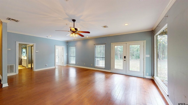 interior space with ceiling fan, ornamental molding, light hardwood / wood-style flooring, and french doors