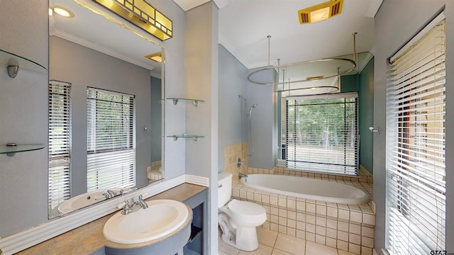 bathroom with tile patterned floors, plenty of natural light, and toilet