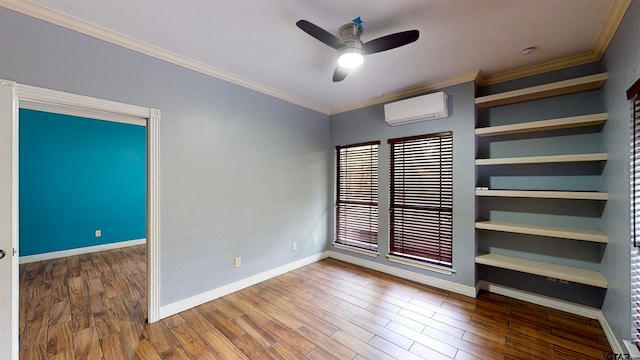 unfurnished bedroom with hardwood / wood-style flooring, a wall mounted AC, crown molding, and ceiling fan