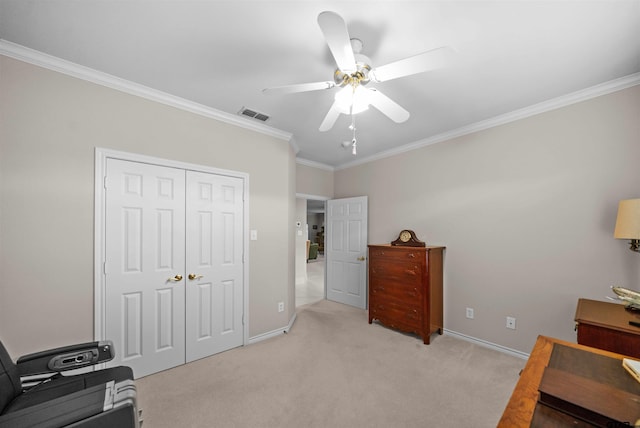 5810 Hollybrook Dr, Tyler, TX 75703 - bedroom with ornamental molding, light carpet, a closet, baseboards, and ceiling fan