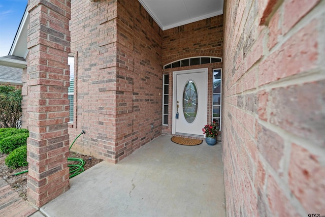 5810 Hollybrook Dr, Tyler, TX 75703 - view of exterior entry with brick siding and covered porch