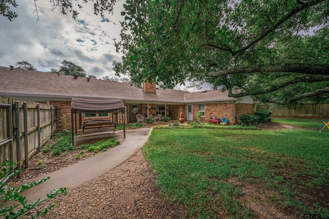 exterior space featuring a lawn