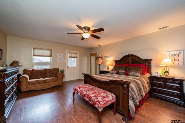 bedroom featuring ceiling fan and dark hardwood / wood-style floors