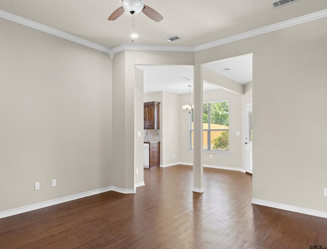 unfurnished room with dark hardwood / wood-style flooring, ceiling fan with notable chandelier, and crown molding