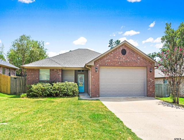 ranch-style home featuring a front lawn and a garage