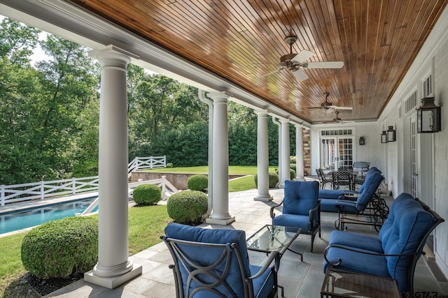 view of patio / terrace featuring french doors and ceiling fan