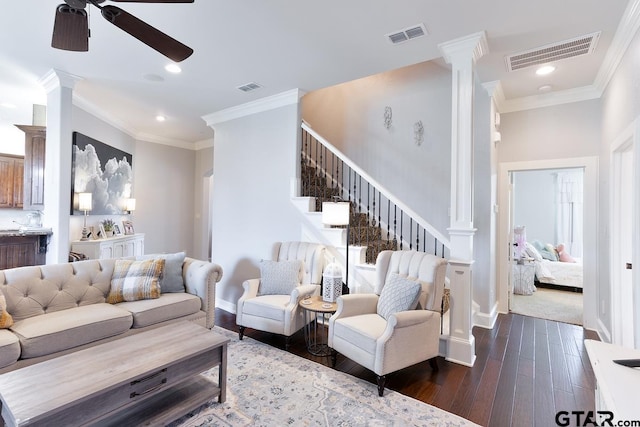 521 Susie St, Chandler, TX 75758 - living area featuring ornate columns, a ceiling fan, dark wood finished floors, ornamental molding, and stairway