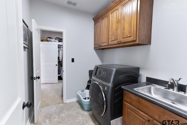 521 Susie St, Chandler, TX 75758 - laundry area with washer / dryer and cabinet space