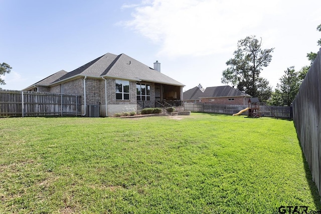521 Susie St, Chandler, TX 75758 - view of yard featuring a playground and central AC