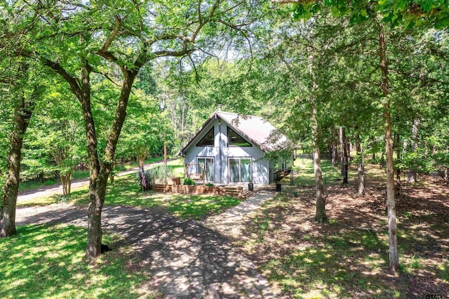 506 S King Lake Rd, Scroggins, TX 75480 - view of front of home featuring a view of trees