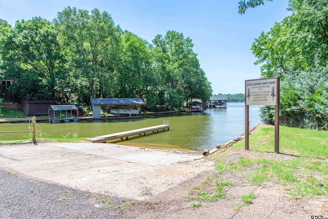 506 S King Lake Rd, Scroggins, TX 75480 - water view with a boat ramp and a boat dock