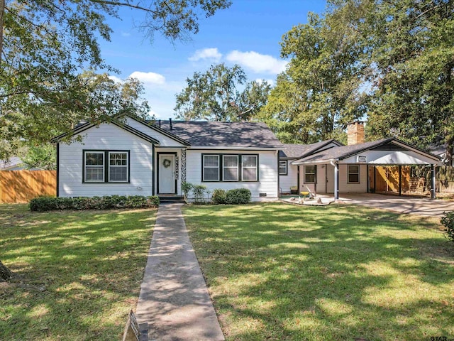 view of front of home with a front lawn