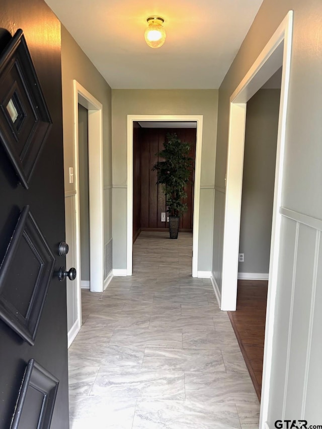 2009 Lindbergh Rd, Tyler, TX 75703 - hall with light marble finish floors