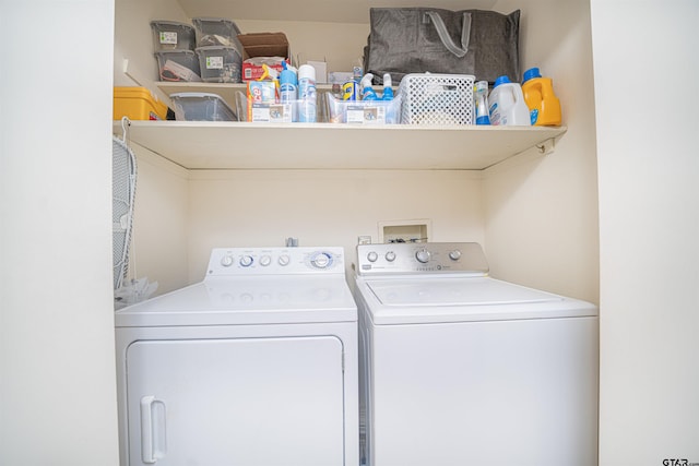 washroom with washer and clothes dryer