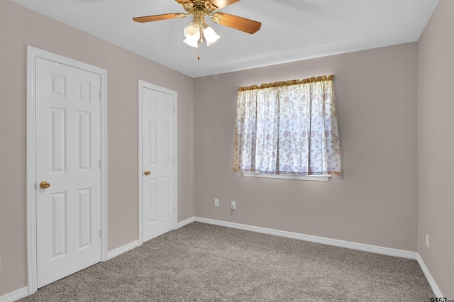 314 Briarcrest Dr, Chandler, TX 75758 - unfurnished bedroom featuring baseboards, carpet flooring, and a ceiling fan