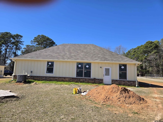 view of front of home with central air condition unit