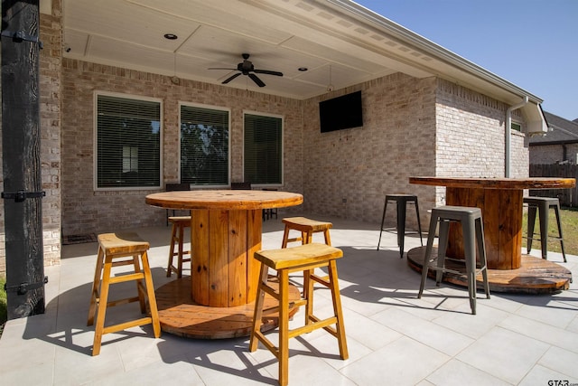 1224 Nate Cir, Bullard, TX 75757 - view of patio featuring outdoor dry bar, outdoor dining space, and a ceiling fan