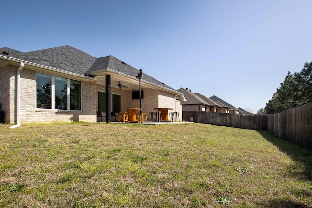 1224 Nate Cir, Bullard, TX 75757 - back of house with a yard, a fenced backyard, brick siding, and ceiling fan