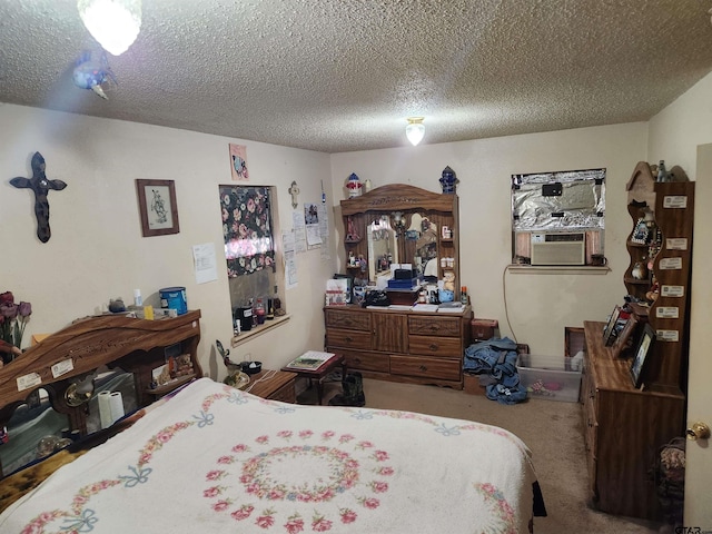 carpeted bedroom featuring cooling unit and a textured ceiling