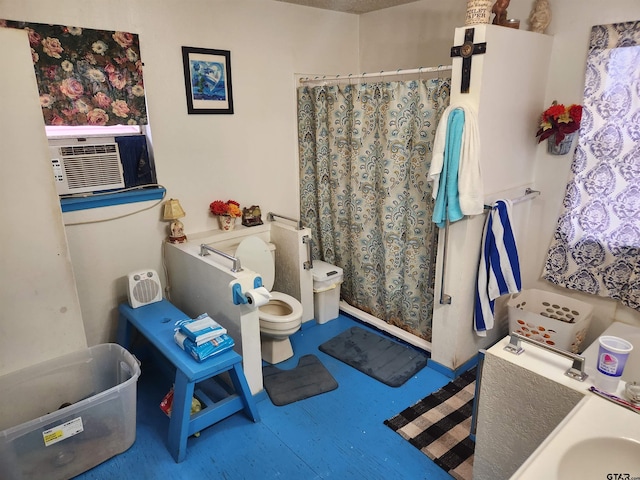 bathroom featuring toilet, cooling unit, and walk in shower