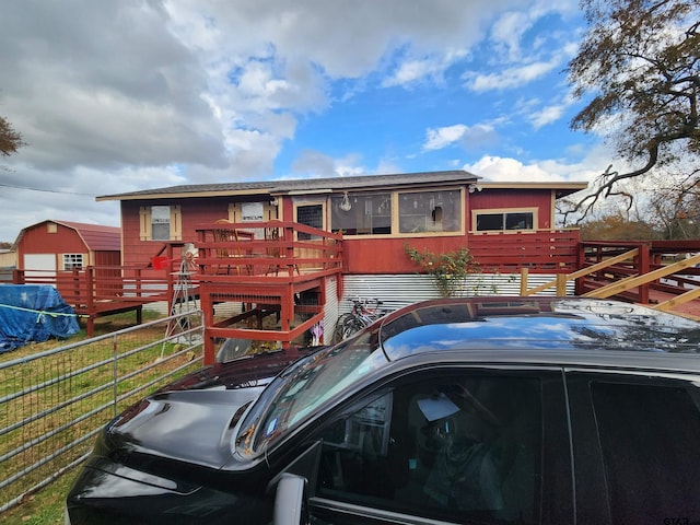 view of front of house featuring a deck