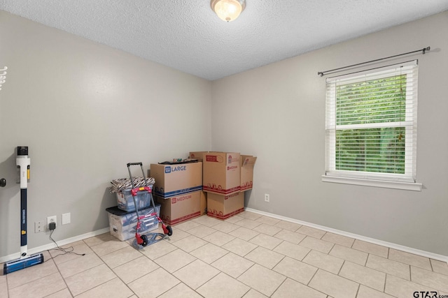 18396 Tall Pines Dr, Tyler, TX 75703 - unfurnished room featuring a textured ceiling and baseboards