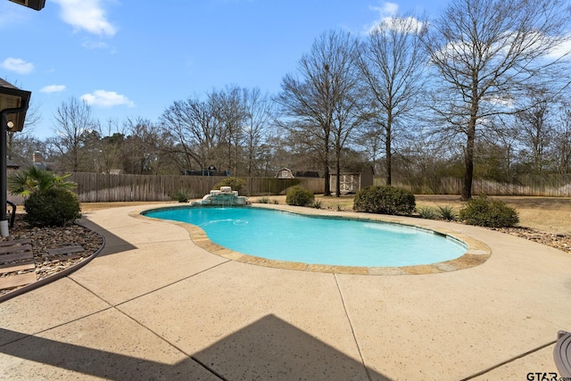 view of swimming pool featuring a patio, a fenced in pool, and a fenced backyard