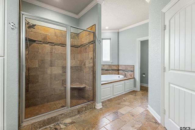 bathroom with a shower stall, crown molding, baseboards, a garden tub, and stone tile flooring