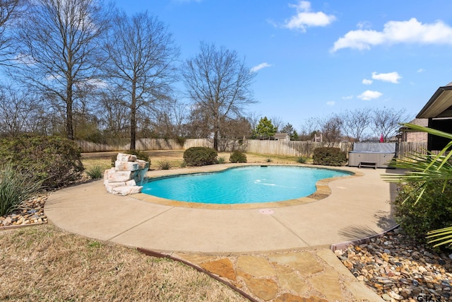 view of pool featuring a patio area, a fenced backyard, and a fenced in pool