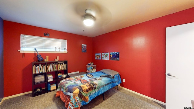 carpeted bedroom featuring ceiling fan