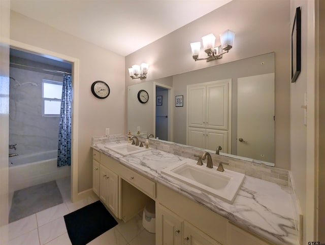 bathroom featuring tile patterned floors, vanity, shower / tub combo, and a notable chandelier