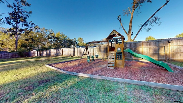 view of play area featuring a lawn