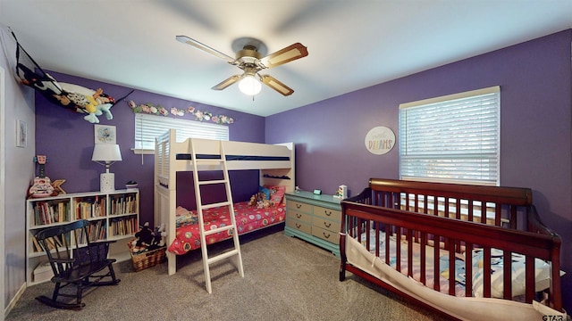 carpeted bedroom featuring ceiling fan