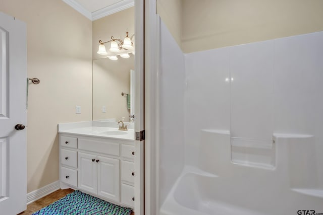 bathroom featuring vanity and crown molding