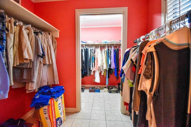 walk in closet featuring light tile patterned floors