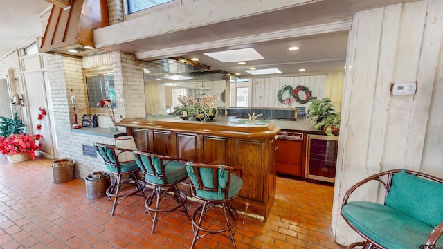 bar with dishwasher and wine cooler